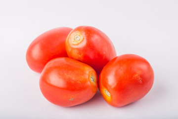 Fresh red tomato isolated on white