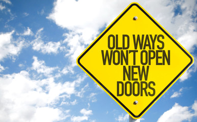 Old Ways Wont Open New Doors sign with sky background
