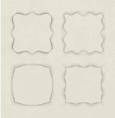 Set of 4 unusual frames in cut of paper style on aged background