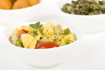 Ackee & Saltfish - Traditional Jamaican dish made of salt cod and ackee fruit. Served with callaloo...