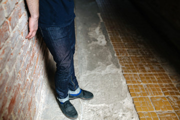 Confident man posing in selvedge  jeans