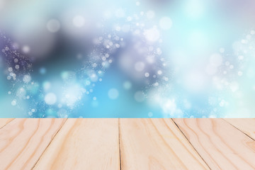 Light bokeh background with wooden paving.