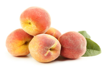 Fresh peaches fruit isolated on a white