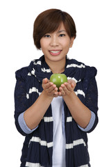 Smiling woman with apple isolated on white Background