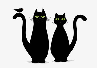 Two cute black cats and bird