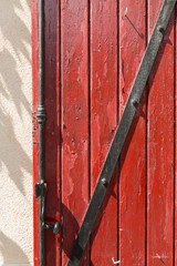 red door with metal in Gordes, France