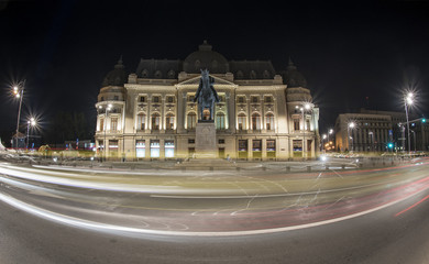 Bucharest, Romania – September 20, 2015 – The Central University Library of Bucharest (Romanian: Biblioteca Centrala Universitara), nightscene. - obrazy, fototapety, plakaty