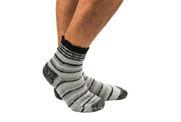 Legs from a businessman without his pants.