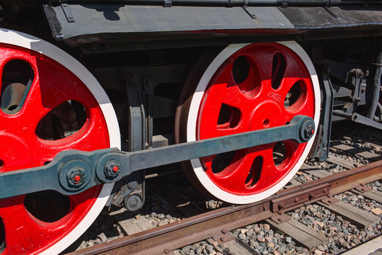 Old steam locomotive painted wheels.