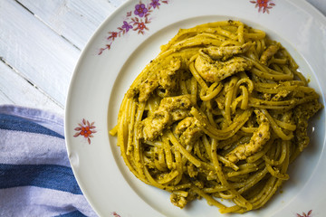 Spaghetti with homemade pesto sauce, top view