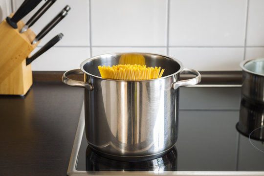 pot of spaghetti on stove in kitchen