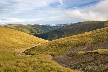 long zigzag path between hills, Fagaras mountains, Romania