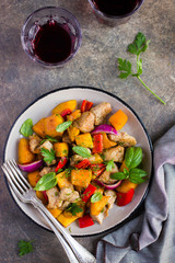 Roasted pumpkin, meat, bell peppers and red onion