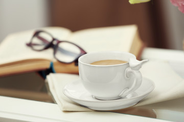 Cup of coffee on table close up