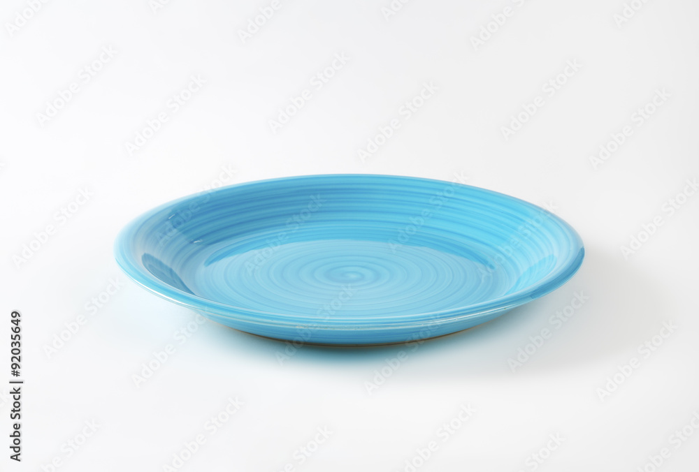 Wall mural Coupe shaped blue ceramic plate