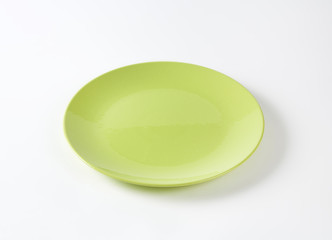 Flat lime green dinner plate