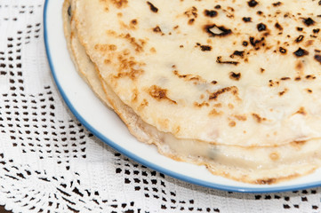 Fresh baked pancakes served on a plate