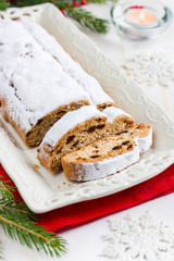 Stollen. Traditional german christmas cake with dried fruits and