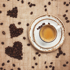 
Cup of coffee, coffee hearts.Top view 