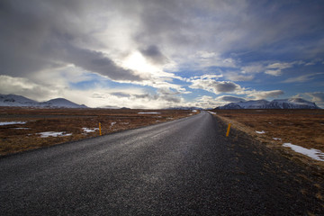 Snowy volcano landscape with dramatic clouds in Iceland