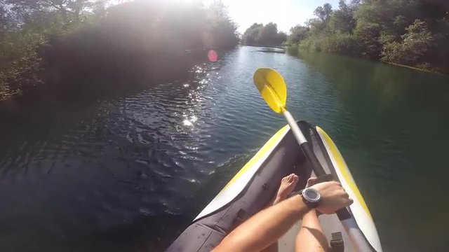 POV Kayak Paddling Down The River In The Sun