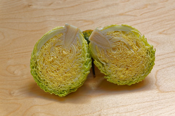 Fototapeta premium Fresh green cabbage among vegetables