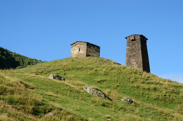Fototapeta na wymiar Ancient ruins of fortified tower at medieval village,Georgia