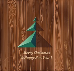 Оригинальная елочка на фоне деревянной текстуры