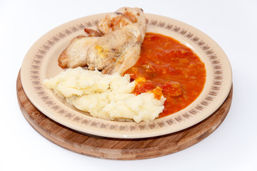 Meat with tomato stew and mashed potato