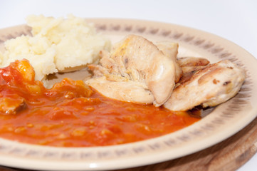 Meat with tomato stew and mashed potato