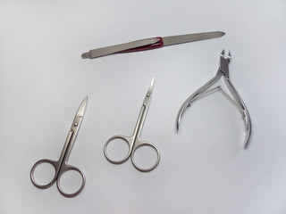 manicure set: nail Nipper, straight scissors; cuticle scissors (nail scissors bent) and nailfile