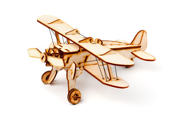 Wooden airplane model on white background