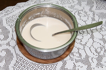 Mixing flour egg and milk for pancakes