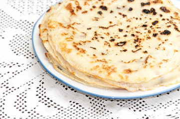 Fresh baked pancakes served on a plate