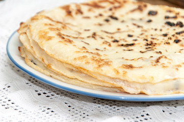 Fresh baked pancakes served on a plate