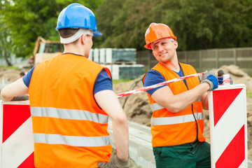 Construction workers talking