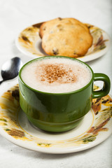 Green cup with chocolate