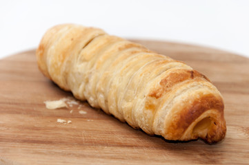 Hot dog puff pastry on the wooden board