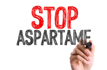 Hand with marker writing: Stop Apastarme