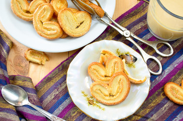 Palmeras - sweet puff pastry. Heart shaped cookies with sugar
