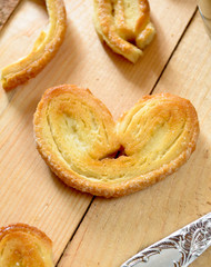 Naklejka na ściany i meble Palmeras - sweet puff pastry. Heart shaped cookies with sugar
