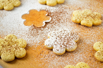 Christmas gingerbread cookies, sprinkled with powdered sugar