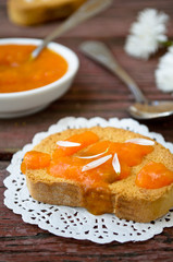 Fresh baked biscottis with raisins and apricot jam