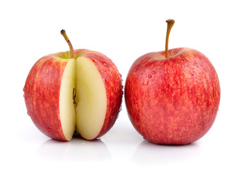 red apple with water drops on white background