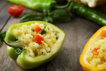 Stuffed peppers with vegetables on table close up