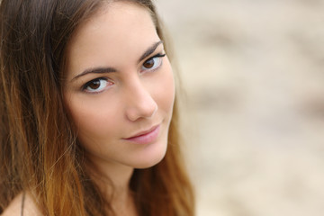Portrait of a beautiful woman with big eyes and smooth skin