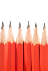 red pencils on white background