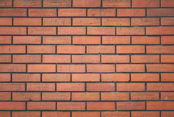 Red brick stone wall seamless background and texture