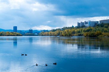 Fototapeta premium Calm urban landscape. Tranquil autumn city landscape before the rain