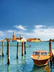 Fototapeten Boat parked beside the Riva degli Schiavoni in Venice, Italy © efired